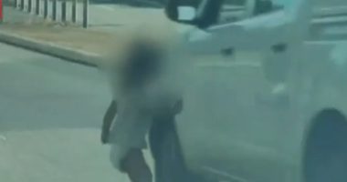 Toddler in diaper running into a road.