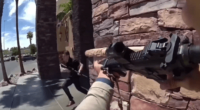 Person aiming a rifle at another person running away.