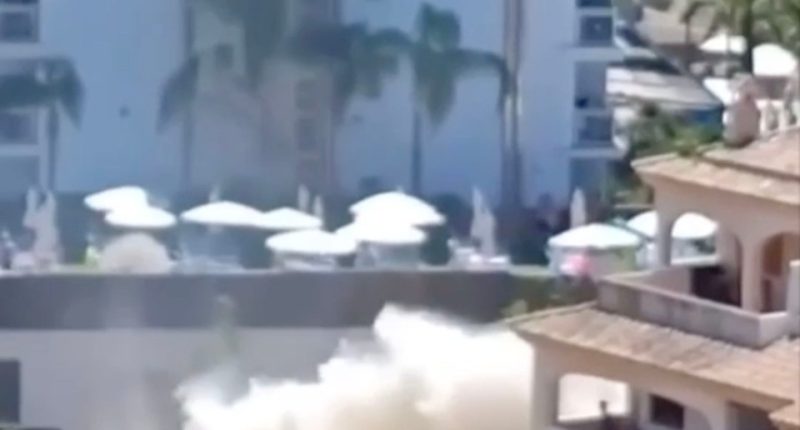 Water pipe explosion causing brown water to flow into the sea near hotels.