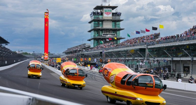 Hot diggity dog! Wienermobiles put on riveting race in Wienie 500 at Indianapolis Motor Speedway