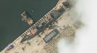 Satellite image of a North Korean warship in a harbor.