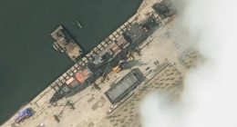 Satellite image of a North Korean warship in a harbor.
