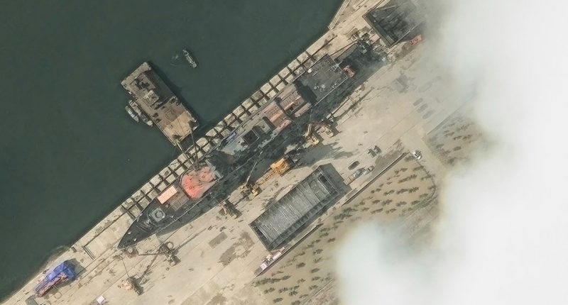 Satellite image of a North Korean warship in a harbor.