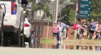 Hundreds line the streets, pay respects during Deputy Brandon Sikes' funeral procession