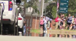 Hundreds line the streets, pay respects during Deputy Brandon Sikes' funeral procession