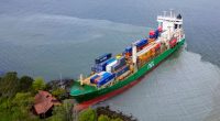 Aerial view of a container ship aground in the Trondheimsfjord.