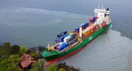 Aerial view of a container ship aground in the Trondheimsfjord.