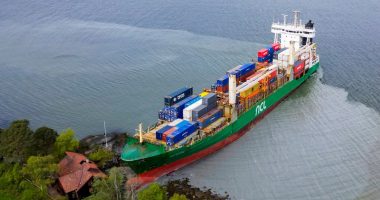 Aerial view of a container ship aground in the Trondheimsfjord.