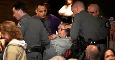 In New York, a GOP congressman is shelled with questions about Trump during raucous town hall