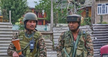 Indian soldiers stand guard at Pampore, in Indian-administered Kashmir, on May 7, 2025.
