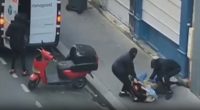 Footage of three masked men forcing a woman into a van.