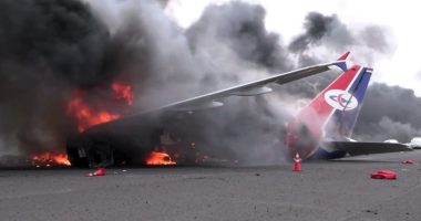 Burning Yemenia Airways plane at Sana'a airport.