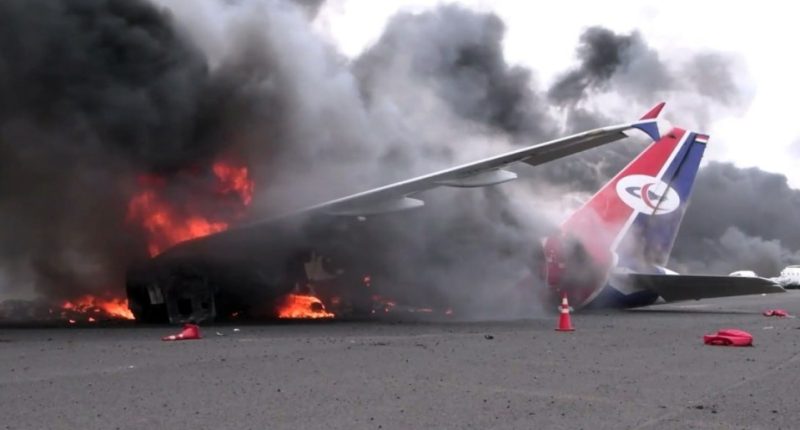 Burning Yemenia Airways plane at Sana'a airport.