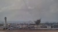 Surveillance footage of a missile impact at Ben Gurion Airport.