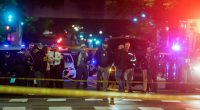 Police officers at a crime scene near the Capital Jewish Museum in Washington, D.C.