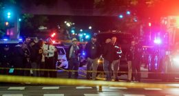 Police officers at a crime scene near the Capital Jewish Museum in Washington, D.C.