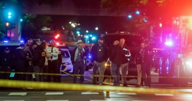 Police officers at a crime scene near the Capital Jewish Museum in Washington, D.C.