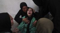 Israeli strikes kill dozens in school-turned-shelter, medics say