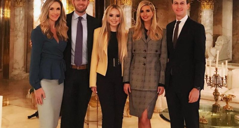 Ivanka Trump, Tiffany Trump, Eric Trump, and two other people posing for a photo.