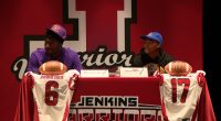 Jenkins sends 2 more football players to college