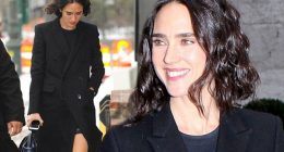 Jennifer Connelly flashes her trim pins in black wool coat and sandals