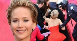 Jennifer Lawrence repeats last year's Oscars fall as she trips on gown