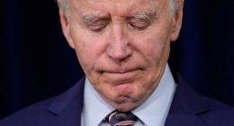 Close-up of President Biden appearing somber.