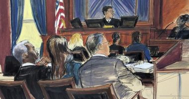 Sean 'Diddy' Combs, far left, looks on from the defense table with his attorneys, as a prospective juror, far right, answers questions posed by Judge Arun Subramanian, center, at Manhattan federal court, Monday, May 5, 2025, in New York. (Elizabeth Williams via AP)