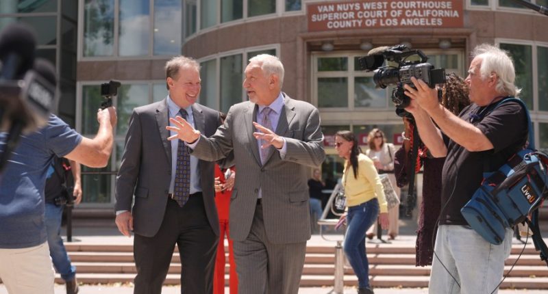 Judge reduces Menendez brothers' murder sentences, putting them a step closer to freedom
