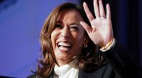 Kamala Harris waving and smiling.