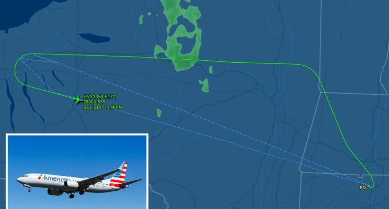 Kansas man accused of throwing, dragging American Airlines flight attendant, prompting in-air emergency