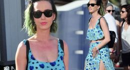 Katy Perry flashes her flat tum as she parties at Coachella