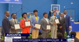 Local middle school boys graduate from mentoring program