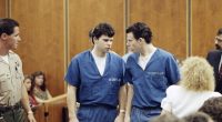 Lyle and Erik Menendez in court, wearing blue jail uniforms.