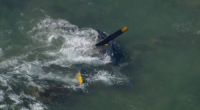 Major emergency after helicopter crashes into beach