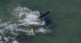 Major emergency after helicopter crashes into beach