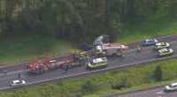 There are grave fears for a man involved in a crash on Queensland's sunshine coast. It is believed a car towing a caravan veered off the Bruce Highway, just before Caloundra, then rolled down an embankment and into a creek at 11.20am today.