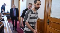 Man throws final insults as he is jailed for 25 years for stabbing famous author