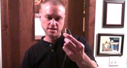 A screenshot of a video Tim Friede posted on YouTube 11 years ago of him being bitten by a taipan.