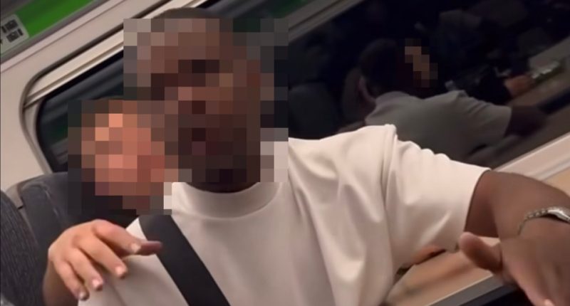 A man on a train threatening women.