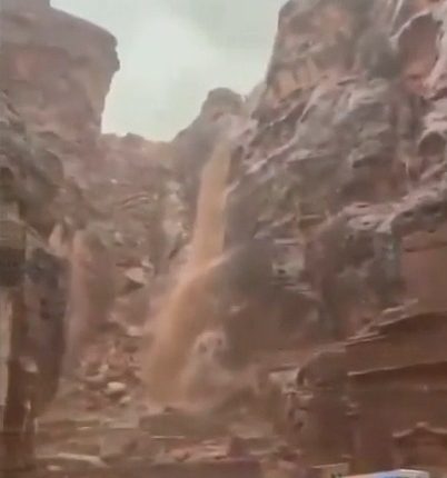 Flash flood in Petra, Jordan, forcing tourist evacuation.