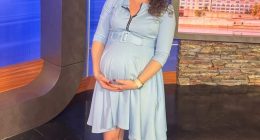 Pregnant news anchor on set.