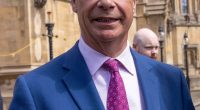 Nigel Farage and Sarah Pochin, Reform's first female MP, outside the Houses of Parliament.