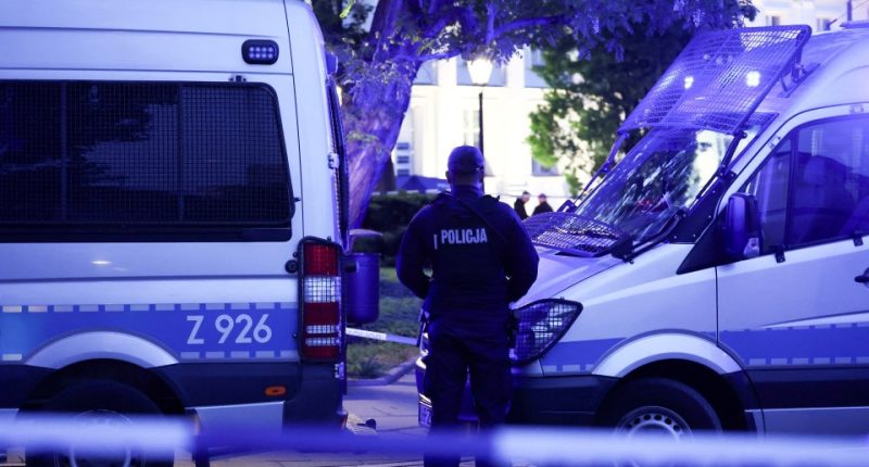 Polish police officers at a secured area.
