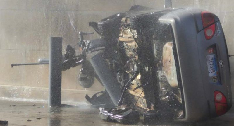 PHOTOS: Springfield fire crews respond to burning, rolled-over vehicle