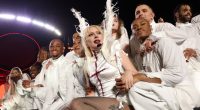 Lady Gaga performing on Copacabana Beach with backup dancers.