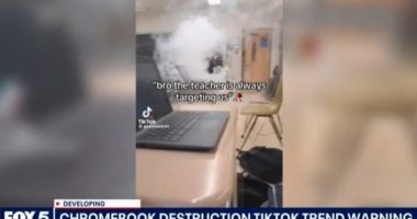 Screenshot of a news report about a TikTok trend of Chromebook destruction in a classroom.