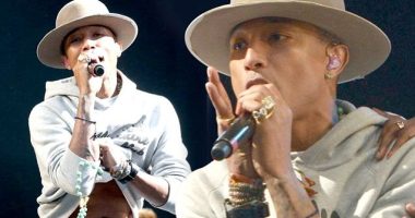Pharrell WIlliams treats fans to glimpse of his toned stomach at show