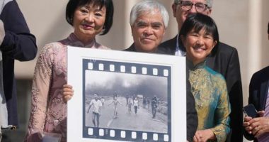 Photo group says it has 'suspended attribution' of historic Vietnam picture because of doubts