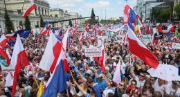 Supporters of Polish presidential candidate Rafal Trzaskowski at the start of the Great Patriots March in Warsaw on May 25